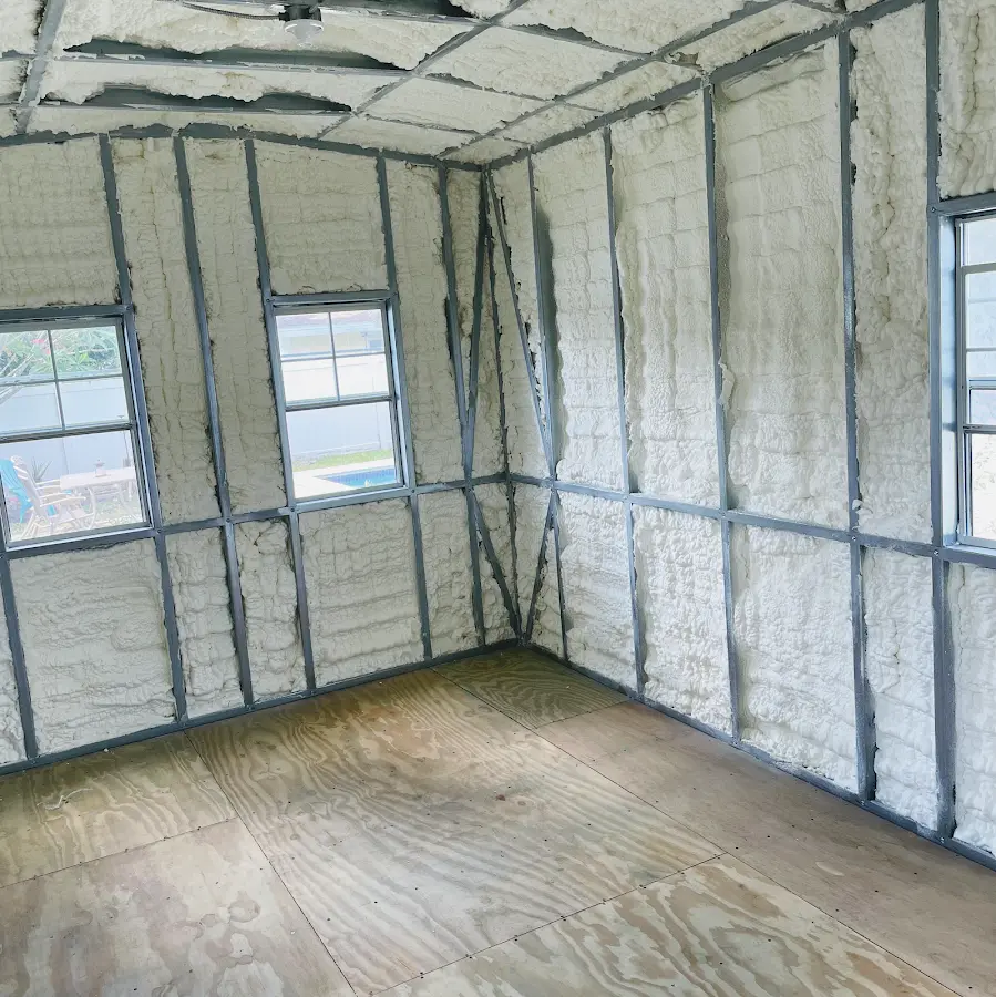 Closed-cell spray foam insulation applied to wall cavities in a residential project in Willoughby